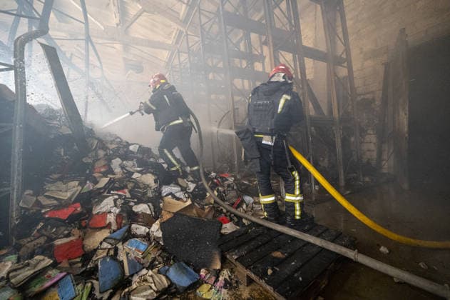 Russian drone strike hits book warehouse in Kharkiv KHARKIV, UKRAINE - AUGUST 1: Firefighters respond to area after two Russian attack drones struck a book warehouse destroying part of the building and sparking a fire that spread across 8,900 square meters in Kharkiv, Ukraine, on August 1, 2026. No casualties were reported, though one firefighter suffered heatstroke while battling the blaze. The warehouse belongs to Ukrainian publisher Ranok and also serves as the distribution center for the KnygoLand bookstore chain. Serhii Masin Anadolu Kharkiv Ukraine. Editorial use only. Please get in touch for any other usage.  Copyright: x2026xAnadoluxSerhiixMasinx