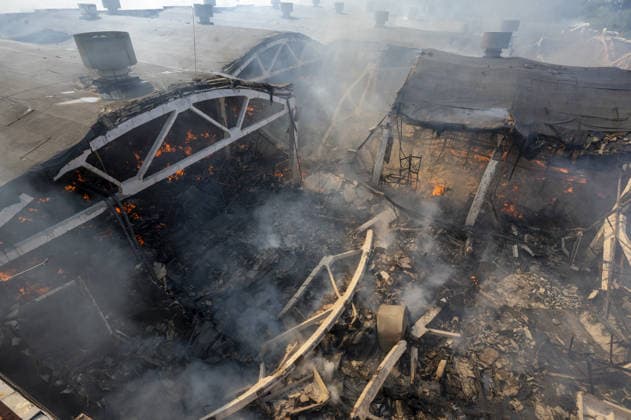 Russian drone strike hits book warehouse in Kharkiv KHARKIV, UKRAINE - AUGUST 1: A view of the fire as firefighters respond to area after two Russian attack drones struck a book warehouse destroying part of the building and sparking a fire that spread across 8,900 square meters in Kharkiv, Ukraine, on August 1, 2026. No casualties were reported, though one firefighter suffered heatstroke while battling the blaze. The warehouse belongs to Ukrainian publisher Ranok and also serves as the distribution center for the KnygoLand bookstore chain. Serhii Masin Anadolu Kharkiv Ukraine. Editorial use only. Please get in touch for any other usage.  Copyright: x2026xAnadoluxSerhiixMasinx