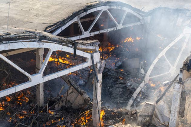Russian drone strike hits book warehouse in Kharkiv KHARKIV, UKRAINE - AUGUST 1: A view of the fire as firefighters respond to area after two Russian attack drones struck a book warehouse destroying part of the building and sparking a fire that spread across 8,900 square meters in Kharkiv, Ukraine, on August 1, 2026. No casualties were reported, though one firefighter suffered heatstroke while battling the blaze. The warehouse belongs to Ukrainian publisher Ranok and also serves as the distribution center for the KnygoLand bookstore chain. Serhii Masin Anadolu Kharkiv Ukraine. Editorial use only. Please get in touch for any other usage.  Copyright: x2026xAnadoluxSerhiixMasinx