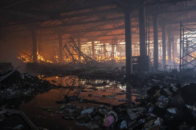Russian drone strike hits book warehouse in Kharkiv KHARKIV, UKRAINE - AUGUST 1: A view of the fire as firefighters respond to area after two Russian attack drones struck a book warehouse destroying part of the building and sparking a fire that spread across 8,900 square meters in Kharkiv, Ukraine, on August 1, 2026. No casualties were reported, though one firefighter suffered heatstroke while battling the blaze. The warehouse belongs to Ukrainian publisher Ranok and also serves as the distribution center for the KnygoLand bookstore chain. Serhii Masin Anadolu Kharkiv Ukraine. Editorial use only. Please get in touch for any other usage.  Copyright: x2026xAnadoluxSerhiixMasinx
