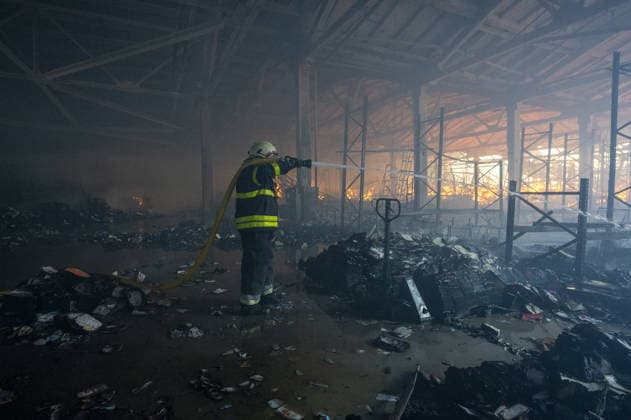 Russian drone strike hits book warehouse in Kharkiv KHARKIV, UKRAINE - AUGUST 1: Firefighters respond to area after two Russian attack drones struck a book warehouse destroying part of the building and sparking a fire that spread across 8,900 square meters in Kharkiv, Ukraine, on August 1, 2026. No casualties were reported, though one firefighter suffered heatstroke while battling the blaze. The warehouse belongs to Ukrainian publisher Ranok and also serves as the distribution center for the KnygoLand bookstore chain. Serhii Masin Anadolu Kharkiv Ukraine. Editorial use only. Please get in touch for any other usage.  Copyright: x2026xAnadoluxSerhiixMasinx