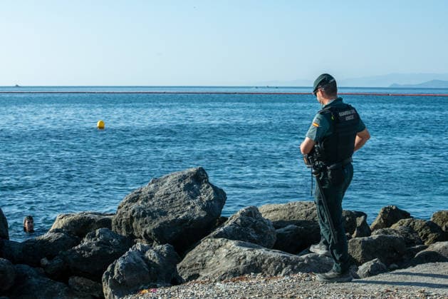 August 2, 2026, Ceuta, Madrid, Spain: A migrant attempts to swim across the border under the watchful eye of the Spanish Civil Guard at El Tarajal beach in Ceuta, Spain, August 2, 2026. Ceuta Spain  - ZUMAd308 20260802_zsp_d308_015 Copyright: xJuanxCarlosxLucasx