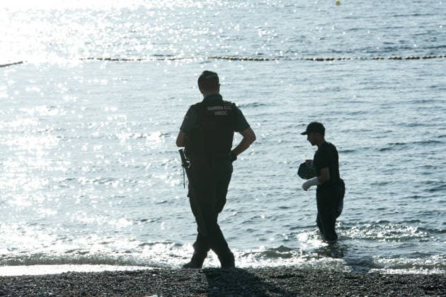 August 2, 2026, Ceuta, Madrid, Spain: A migrant attempts to swim across the border under the watchful eye of the Spanish Civil Guard at El Tarajal beach in Ceuta, Spain, August 2, 2026. Ceuta Spain  - ZUMAd308 20260802_zsp_d308_025 Copyright: xJuanxCarlosxLucasx