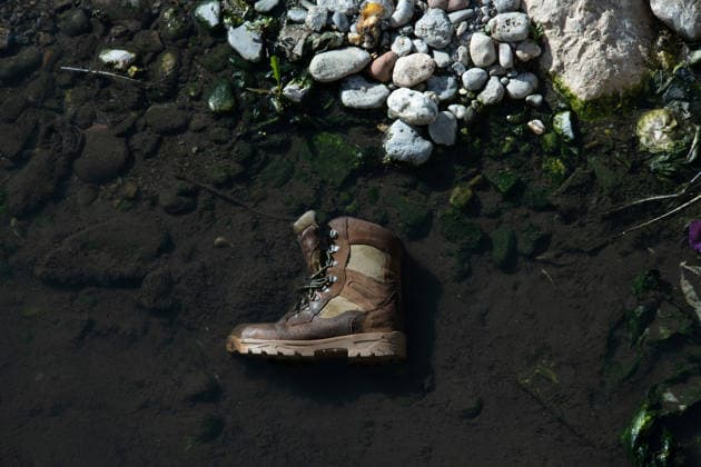 August 2, 2026, Ceuta, Madrid, Spain: A migrant s boot lies abandoned on the sand at El Tarajal beach in the Spanish enclave of Ceuta, Spain, August 2, 2026. Ceuta Spain  - ZUMAd308 20260802_zsp_d308_035 Copyright: xJuanxCarlosxLucasx