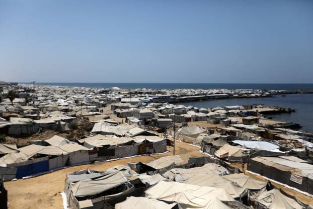 Displaced Palestinians shelter in overcrowded tents at Gaza seaport General views show tents sheltering displaced Palestinians crowded along the Gaza seaport in Gaza City on August 2, 2026, as thousands of families continue to rely on temporary shelters lacking many basic services amid high summer temperatures. The United Nations says more than 90 percent of the Gaza Strip s estimated 2.1 million residents have been displaced since the outbreak of the war, with many living in overcrowded displacement sites or temporary tents. UN agencies warn that overcrowding, shortages of clean water and sanitation services, and accumulating waste are increasing the risk of disease outbreaks as displaced families endure harsh summer conditions. Photo by B Copyright: xapaimagesxBilalxOsamax xapaimagesx
