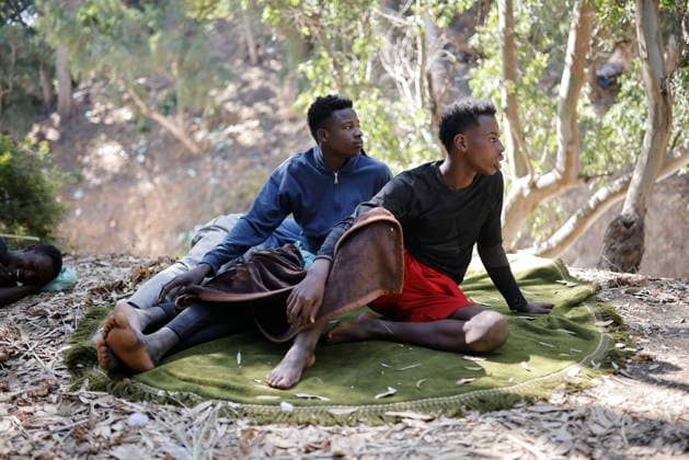 The barriers installed by the government in Ceuta are now fully operational. Two people rest on the street on August 2, 2026, in Ceuta, Spain. The Tarajal border has remained calm despite a small group of people attempting to cross by swimming, but they were intercepted by the army. Although more than 48,000 migrants who had entered irregularly last Thursday have already left Ceuta, an unknown number of people remain in the city who have chosen not to return. AUGUST 2, 2026 PIXELATED MIGRATION CRISIS Jesú Ceuta Ceuta, Spain  Copyright: xJesusxTorresx 7699322