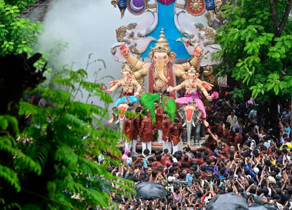 MUMBAI, INDIA - AUGUST 2: Devotees carry the Lord Ganesha idol ahead of Ganesh festival from Parel workshop, on August 2, 2026 in Mumbai, India. (Photo by Anshuman Poyrekar Hindustan Times ) Preparation Of Ganesh Chaturthi Festival