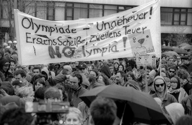NoLympia Deutschland, Berlin, 18.04.1993, NoLympia Demo, Olympiade Ungeheuer - erstens Scheiße, zweitens teuer, Nolympia, Â *** NoLympia Germany, Berlin, April 18, 1993, NoLympia Protest, The Olympics are, first of all, crap, and second, expensive, NoLympia, Â