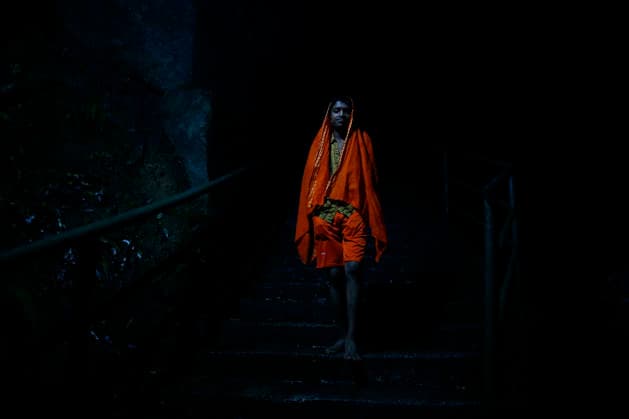 August 2, 2027, Kathmandu, Nepal: A Bol Bom pilgrim arrives to offer prayers and collect holy water from the Bagmati River during the Shrawan pilgrimage at Sundarijal in Kathmandu, Nepal, on Monday, August 3, 2026. During the holy month of Shrawan, thousands of barefoot devotees from Nepal and India carry sacred water to offer at the Pashupatinath Temple in worship of Lord Shiva. Kathmandu Nepal - ZUMAg200 20270802_zap_g200_001 Copyright: xSkandaxGautamx
