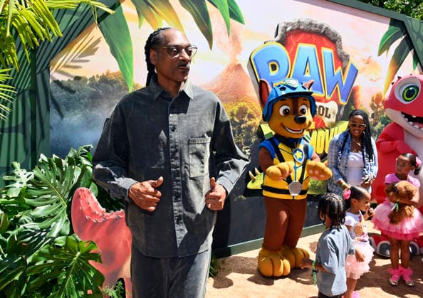 Cast member Snoop Dogg attends the global premiere of the computer animated animal adventure Paw Patrol: The Dino Movie at the Paramount Picture Studio lot in Los Angeles on Sunday, August 2, 2026. Storyline: The Paw Patrol lands on a mysterious dinosaur island after a storm, where they meet Rex, a stranded pup. When Humdinger s reckless mining triggers a volcano, the team faces their biggest rescue mission yet to save the island.  LAP2026080221 JIMxRUYMEN