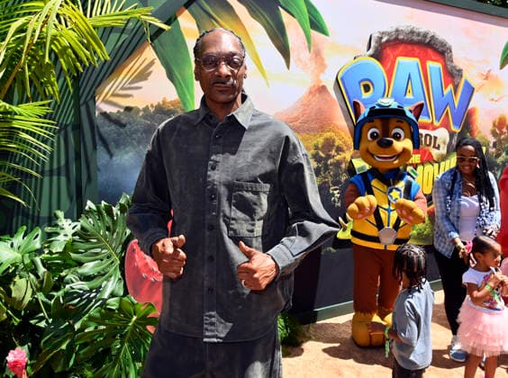 Cast member Snoop Dogg attends the global premiere of the computer animated animal adventure Paw Patrol: The Dino Movie at the Paramount Picture Studio lot in Los Angeles on Sunday, August 2, 2026. Storyline: The Paw Patrol lands on a mysterious dinosaur island after a storm, where they meet Rex, a stranded pup. When Humdinger s reckless mining triggers a volcano, the team faces their biggest rescue mission yet to save the island.  LAP2026080222 JIMxRUYMEN