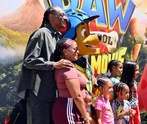 Snoop Dogg, Shante Monique Broadus with family attend the global premiere of the computer animated animal adventure Paw Patrol: The Dino Movie at the Paramount Picture Studio lot in Los Angeles on Sunday, August 2, 2026. Storyline: The Paw Patrol lands on a mysterious dinosaur island after a storm, where they meet Rex, a stranded pup. When Humdinger s reckless mining triggers a volcano, the team faces their biggest rescue mission yet to save the island.  LAP2026080233 JIMxRUYMEN