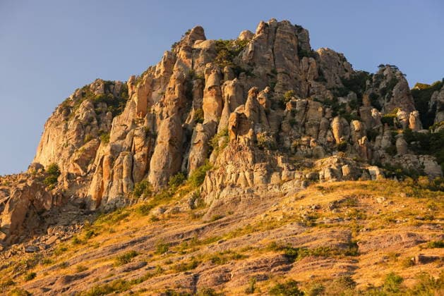Creative Highlights World RUSSIA, REPUBLIC OF CRIMEA - AUGUST 2, 2026: Cliffs rise over the Valley of Ghosts outside the Black Sea resort city of Alushta on the southern coast of Crimea. Maxim Churusov TASS  95756691