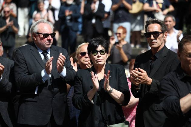 French Singer and Pianist Marie-Paule Belle Funeral - Paris Liane Foly and Relatives after the funeral ceremony for French singer and pianist Marie-Paule Belle at Saint Roch church in Paris, France on August 3, 2026. She died from breast cancer at age 80 on July 25, 2026, in Neuilly-sur-Seine. She was best known for her 1976 hit song La Parisienne ». Photo by Raphael Lafargue ABACAPRESS.COM Paris Ile-de-France France  Copyright: xLafarguexRaphael ABACAx