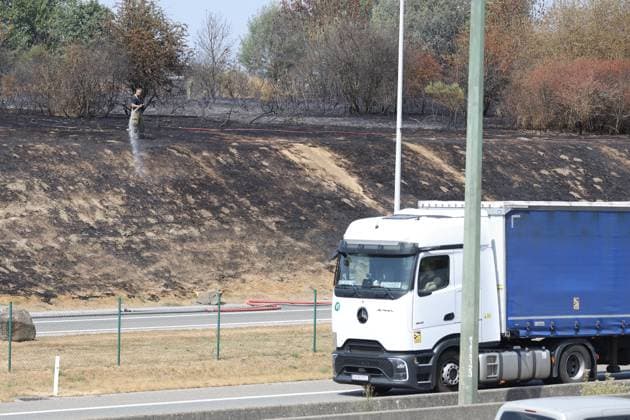 The scene of a brush fire along the E25 highway in Bastogne, on Monday 03 August 2026. A major brush fire broke out Monday morning in the municipality of Bastogne, near the Withimont highway rest area.  JULIENxWARNAND 182682023