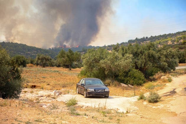 Wildfire in Greece s Megara region MEGARA, GREECE - AUGUST 3: Firefighters operate on the ground as a wildfire continues to burn for a third consecutive day in the Megara region, west of Athens, Greece on August 3, 2026. Emergency services are working to contain the blaze amid challenging weather conditions across the area. Aris Oikonomou Anadolu Megara Greece. Editorial use only. Please get in touch for any other usage.  Copyright: x2026xAnadoluxArisxOikonomoux