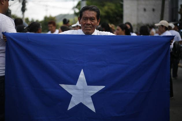 Former Honduran President Hernandez appears before Supreme Court over corruption allegations TEGUCIGALPA, HONDURAS - AUGUST 3: People gather as former Honduran President Juan Orlando Hernandez arrives at the Supreme Court of Justice to attend his initial hearing regarding alleged corruption cases during his presidency in Tegucigalpa, Honduras on August 3, 2026. Emilio Flores Anadolu Tegucigalpa Honduras. Editorial use only. Please get in touch for any other usage.  Copyright: x2026xAnadoluxEmilioxFloresx