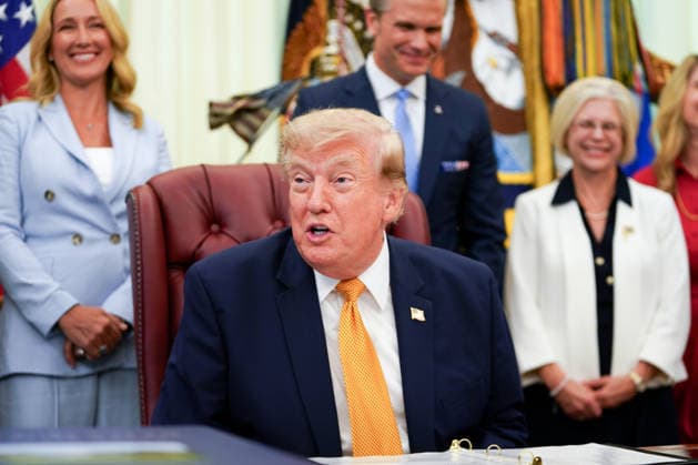 President Donald Trump announces an executive order establishing the Presidential Military Spouse Commission in the Oval Office at the White House in Washington, DC on Monday, August 3, 2026. The advisory board, led by Jennifer Hegseth, wife of Secretary of Defense Pete Hegseth, will focus on key quality-of-life areas for military families including employment, childcare, housing, healthcare, and education.  WASP20260803101 AllisonxRobbert