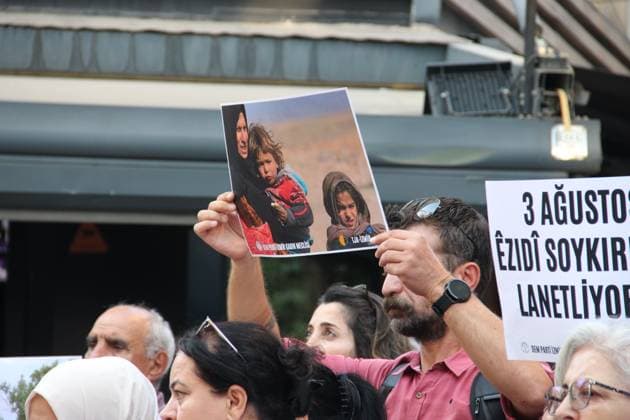 Yazidi Genocide Anniversary Commemorated in Ä°zmir Ä°ZMÄ°R, Türkiye August 3, 2026: Members of the DEM Party Women™s Assembly and the Free Women™s Movement (Tevgera JinÃªn Azad) hold a press statement in Alsancak to mark the 12th anniversary of the ISIS attack on the Yazidi community in Sinjar, Iraq. Participants display photographs of Yazidi women who were killed, abducted, or subjected to sexual slavery during the 2014 attacks, commemorating victims of atrocities recognized by the United Nations and the European Parliament as genocide. Izmir Türkiye Copyright: x xNagihanxCakirx xJNAxPressx
