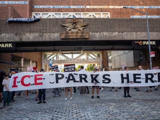 August 3, 2026, New York, New York, USA: Sign reads ICE Parks Here in a Rise & Resist protests against icon Parking holding a fleet of their vehicles in one of itÃ¢â‚¬â ¢s garages in Tribeca, NYC. New York USA - ZUMAc266 20260803_znp_c266_006 Copyright: xCarlosxChiossonex