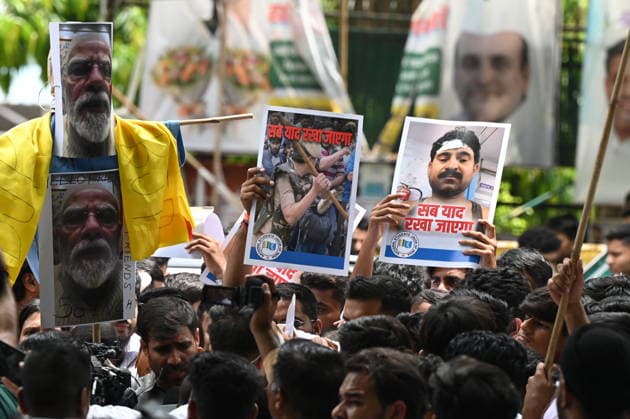 NEW DELHI, INDIA - AUGUST 3: NSUI members hold placards and shout slogans against the Delhi Police and central authorities during protest march from the Indian Youth Congress office towards Jantar Mantar condemning police action against student demonstrators during the recent July 20 Parliament march on August 3, 2026 in New Delhi, India. The student wing of the Congress party demanded a thorough judicial probe into the alleged police crackdown, lathi-charge, and use of teargas and pellet guns against student protesters during the July 20 Parliament march. The demonstrators also demanded the immediate withdrawal of FIRs registered against student activists. (Photo by Ishant Chauhan Hindustan Times) NSUI Protest March Against Alleged Use Of