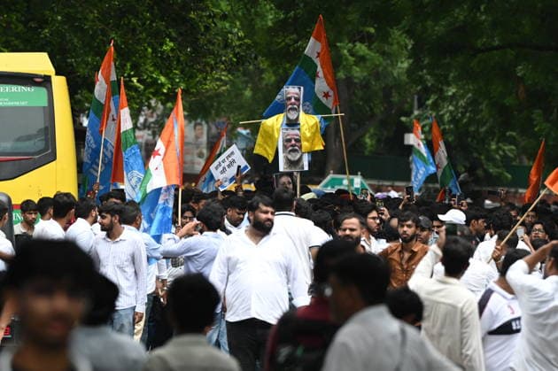 NEW DELHI, INDIA - AUGUST 3: NSUI members hold placards and shout slogans against the Delhi Police and central authorities during protest march from the Indian Youth Congress office towards Jantar Mantar condemning police action against student demonstrators during the recent July 20 Parliament march on August 3, 2026 in New Delhi, India. The student wing of the Congress party demanded a thorough judicial probe into the alleged police crackdown, lathi-charge, and use of teargas and pellet guns against student protesters during the July 20 Parliament march. The demonstrators also demanded the immediate withdrawal of FIRs registered against student activists. (Photo by Ishant Chauhan Hindustan Times) NSUI Protest March Against Alleged Use Of