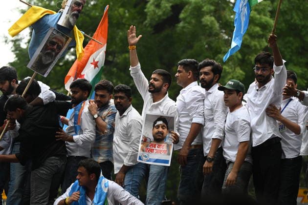 NEW DELHI, INDIA - AUGUST 3: NSUI members hold placards and shout slogans against the Delhi Police and central authorities during protest march from the Indian Youth Congress office towards Jantar Mantar condemning police action against student demonstrators during the recent July 20 Parliament march on August 3, 2026 in New Delhi, India. The student wing of the Congress party demanded a thorough judicial probe into the alleged police crackdown, lathi-charge, and use of teargas and pellet guns against student protesters during the July 20 Parliament march. The demonstrators also demanded the immediate withdrawal of FIRs registered against student activists. (Photo by Ishant Chauhan Hindustan Times) NSUI Protest March Against Alleged Use Of