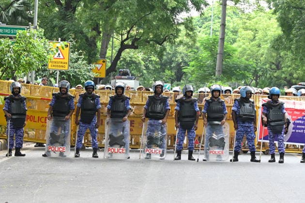 NEW DELHI, INDIA - AUGUST 3: Security forces deployed during protest march by NSUI members from the Indian Youth Congress office towards Jantar Mantar condemning police action against student demonstrators during the recent July 20 Parliament march on August 3, 2026 in New Delhi, India. The student wing of the Congress party demanded a thorough judicial probe into the alleged police crackdown, lathi-charge, and use of teargas and pellet guns against student protesters during the July 20 Parliament march. The demonstrators also demanded the immediate withdrawal of FIRs registered against student activists. (Photo by Ishant Chauhan Hindustan Times) NSUI Protest March Against Alleged Use Of Force And Pellet Guns Against Students