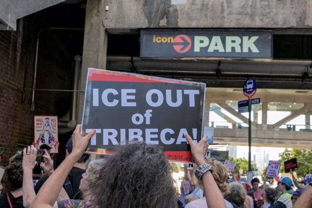 August 3, 2026, New York, New York, USA: Tribeca residents and supporters demonstrate against ICE vehicles parking at ICON Parking garage.on Harrison Street in IPN Plaza Tribeca. It is believed the garage holds a fleet of new unlicensed SUV s.the type ICE uses in their arrest deportation operations. The garage is close to their offices at 26 Federal Plaza and the .ICE Field Offices on Varick Street. New York USA - ZUMAh156 20260803_znp_h156_002 Copyright: xMiloxHessx