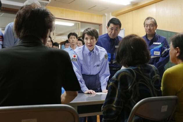 Japan PM Takaichi visits quake-hit Kumamoto Japanese Prime Minister Sanae Takaichi (C) meets with people at an evacuation center in Hikawa in Kumamoto Prefecture on Aug. 3, 2026, after a powerful earthquake struck the southwestern Japan prefecture and its vicinity on July 28. (Pool photo)  A14AA0005625015P