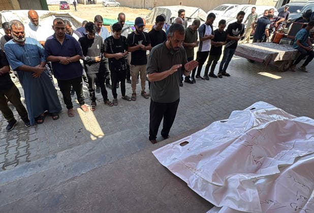 Mourners bid farewell to two men killed in Gaza City strike Mourners bid farewell to the bodies of two Palestinian men at Al-Aqsa Martyrs Hospital in Deir al-Balah, central Gaza Strip, on August 4, 2026, after they were killed, according to Gaza health authorities, in an Israeli airstrike that targeted the vehicle they were traveling in on al-Rashid Street, west of Gaza City, the previous night. Photo by Ahmed Ibrahim apaimages Deir al-Balah Gaza Palestinian Territory 040826_Deir_al-Balah_AI_00(5) Copyright: xapaimagesxAhmedxIbrahimx xapaimagesx