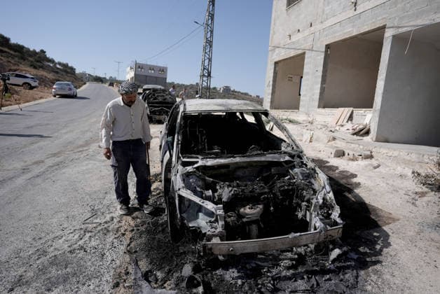 Israeli settlers set fire to three cars and damaged a power line in Nablus NABLUS, WEST BANK, PALESTINE - AUGUST 04: Palestinians inspect burnt-out cars following a raid by Israeli settlers who attacked homes, set three cars on fire, and damaged power lines between the villages of Jalud and Telfit near Nablus in West Bank, Palestine on August 04, 2026. Issam Rimawi Anadolu Nablus West Bank. Editorial use only. Please get in touch for any other usage.  Copyright: x2026xAnadoluxIssamxRimawix