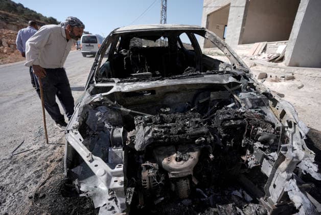 Israeli settlers set fire to three cars and damaged a power line in Nablus NABLUS, WEST BANK, PALESTINE - AUGUST 04: Palestinians inspect burnt-out cars following a raid by Israeli settlers who attacked homes, set three cars on fire, and damaged power lines between the villages of Jalud and Telfit near Nablus in West Bank, Palestine on August 04, 2026. Issam Rimawi Anadolu Nablus West Bank. Editorial use only. Please get in touch for any other usage.  Copyright: x2026xAnadoluxIssamxRimawix