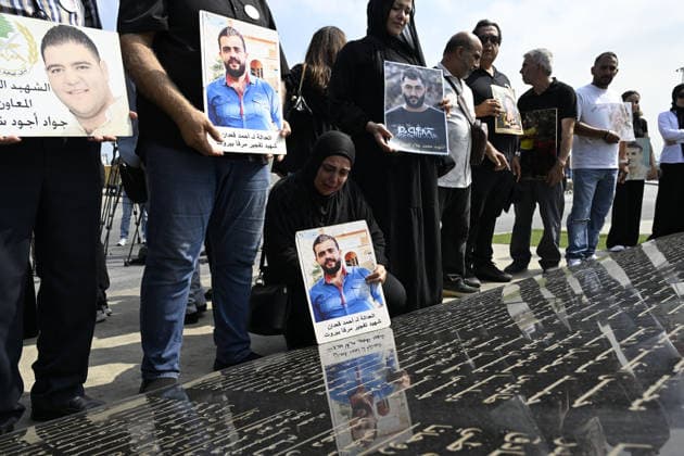 Memorial ceremony held in Lebanon to mark sixth anniversary of Beirut Port explosion BEIRUT, LEBANON - AUGUST 4: People attend a memorial ceremony held in front of the monument bearing the names of those killed in the Aug. 4, 2020 Beirut Port explosion, marking the sixth anniversary of the disaster while holding photos, in Beirut, Lebanon, on August 4, 2026. The ceremony was attended by families of the victims, Lebanese Justice Minister Adel Nassar, Information Minister Paul Markus, Social Affairs Minister Haneen El Sayed, ambassadors of several countries that lost citizens in the explosion, and other members of the diplomatic corps. Houssam Shbaro Anadolu Beirut Lebanon. Editorial use only. Please get in touch for any other usage.  Copyright: x2026xAnadoluxHoussamxShbarox