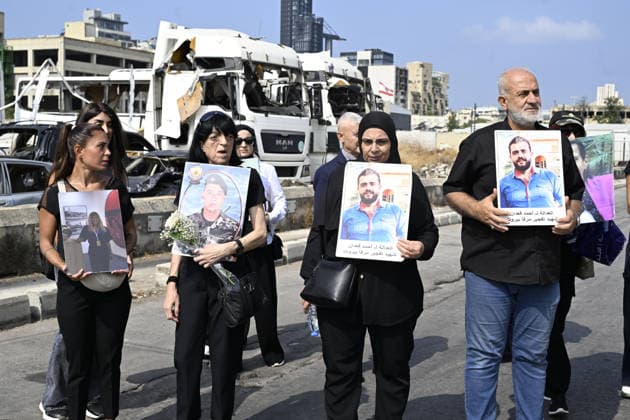 Memorial ceremony held in Lebanon to mark sixth anniversary of Beirut Port explosion BEIRUT, LEBANON - AUGUST 4: People attend a memorial ceremony held in front of the monument bearing the names of those killed in the Aug. 4, 2020 Beirut Port explosion, marking the sixth anniversary of the disaster while holding photos, in Beirut, Lebanon, on August 4, 2026. The ceremony was attended by families of the victims, Lebanese Justice Minister Adel Nassar, Information Minister Paul Markus, Social Affairs Minister Haneen El Sayed, ambassadors of several countries that lost citizens in the explosion, and other members of the diplomatic corps. Houssam Shbaro Anadolu Beirut Lebanon. Editorial use only. Please get in touch for any other usage.  Copyright: x2026xAnadoluxHoussamxShbarox