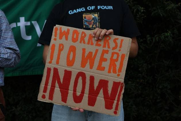 August 4, 2026, London, England, United Kingdom: Members of the App Drivers & Couriers Union (ADCU), Brent Green Party and the Pull the Plug on Waymo campaign attend a protest outside WAYMO s offices in Park Royal, London, opposing the expansion of autonomous vehicles. Demonstrators argued that driverless technology threatens drivers job security and livelihoods and called for greater protections for workers rights. London United Kingdom  - ZUMAa279 20260804_zsp_a279_003 Copyright: xZeynepxDemirxAslimx
