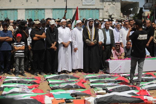 Mass funeral held for recovered remains in Gaza City s Sabra neighborhood Palestinians take part in a mass funeral for the recovered remains of members of the Abu Sharia and Al-Hasayna families in the Sabra neighborhood of Gaza City on August 4, 2026. The remains were recently recovered from beneath the rubble of their homes, which were destroyed in an Israeli strike earlier in the war. Gaza s Civil Defense said its crews recovered the remains of 112 people during a two-week operation in the residential area where the two families lived, which it said was hit in an Israeli airstrike on November 23, 2023. The Civil Defense estimates that more than 9,000 people remain missing or buried beneath the rubble of destroyed buildings across the Gaza Copyright: xapaimagesxBilalxOsamax xapaimagesx