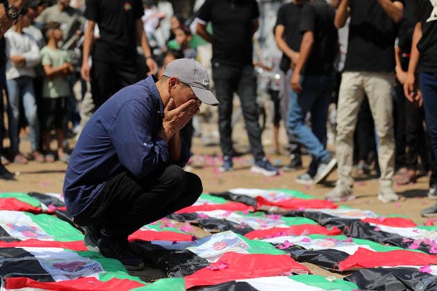 Mass funeral held for recovered remains in Gaza City s Sabra neighborhood Palestinians take part in a mass funeral for the recovered remains of members of the Abu Sharia and Al-Hasayna families in the Sabra neighborhood of Gaza City on August 4, 2026. The remains were recently recovered from beneath the rubble of their homes, which were destroyed in an Israeli strike earlier in the war. Gaza s Civil Defense said its crews recovered the remains of 112 people during a two-week operation in the residential area where the two families lived, which it said was hit in an Israeli airstrike on November 23, 2023. The Civil Defense estimates that more than 9,000 people remain missing or buried beneath the rubble of destroyed buildings across the Gaza Copyright: xapaimagesxBilalxOsamax xapaimagesx