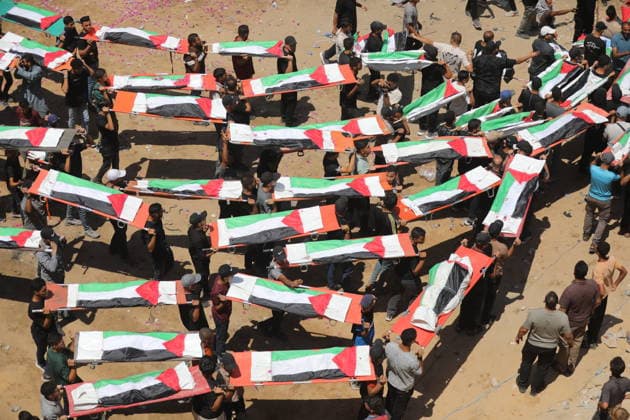 Mass funeral held for recovered remains in Gaza City s Sabra neighborhood Palestinians take part in a mass funeral for the recovered remains of members of the Abu Sharia and Al-Hasayna families in the Sabra neighborhood of Gaza City on August 4, 2026. The remains were recently recovered from beneath the rubble of their homes, which were destroyed in an Israeli strike earlier in the war. Gaza s Civil Defense said its crews recovered the remains of 112 people during a two-week operation in the residential area where the two families lived, which it said was hit in an Israeli airstrike on November 23, 2023. The Civil Defense estimates that more than 9,000 people remain missing or buried beneath the rubble of destroyed buildings across the Gaza Copyright: xapaimagesxBilalxOsamax xapaimagesx