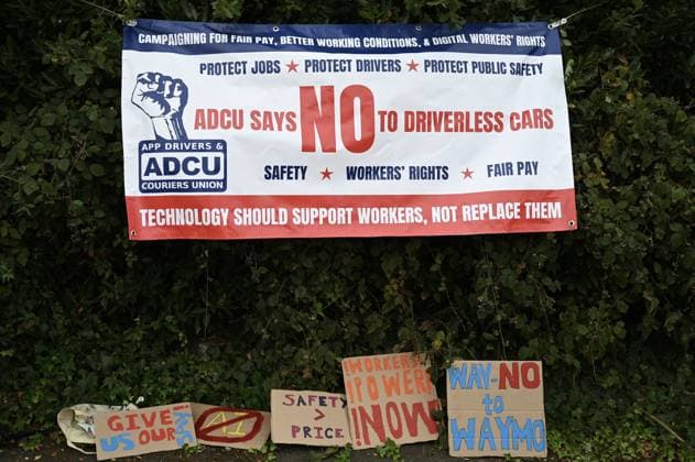 Protesters rally in London against driverless vehicles LONDON, UNITED KINGDOM - AUGUST 4: Members of the App Drivers &amp; Couriers Union (ADCU), Brent Green Party and the Pull the Plug on Waymo campaign stage a protest outside Waymo’s office in Park Royal against the expansion of driverless vehicles in London, United Kingdom, on August 4, 2026. Demonstrators argue that autonomous vehicles threaten drivers’ job security and livelihoods and call for workers’ rights to be protected. Rasid Necati Aslim Anadolu London United Kingdom. Editorial use only. Please get in touch for any other usage.  Copyright: x2026xAnadoluxRasidxNecatixAslimx