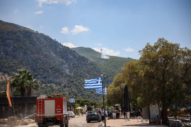 Wildfire continues for fourth day in Psatha, Greece PSATHA, GREECE - AUGUST 04: Helicopters continue firefighting operations as a wildfire burns for the fourth consecutive day in Psatha, Greece, on August 04, 2026. Thousands of square meters of forest, along with several houses, have been destroyed. Although the fire fronts have calmed after four days of intense burning, authorities remain on alert. Aris Oikonomou Anadolu Psatha Greece. Editorial use only. Please get in touch for any other usage.  Copyright: x2026xAnadoluxArisxOikonomoux
