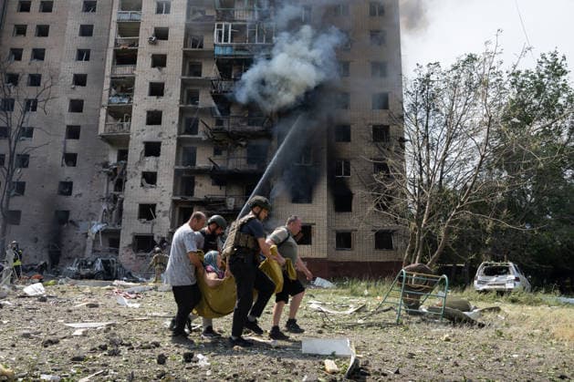 August 4, 2026, Kramatorsk, Donetsk Oblast, Ukraine: Emergency services work to aid the community after Russia launches an attack on residential buildings in the city of Kramatorsk, Donetsk Oblast. Kramatorsk Ukraine - ZUMAm350 20260804_zip_m350_039 Copyright: xCameronxJones-Manleyx