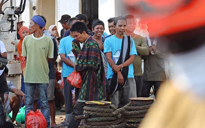 Survivors of Indonesian Ferry Fire Describe Chaotic Evacuation SURABAYA, EAST JAVA, INDONESIA AUGUST 4, 2026: Survivors of the KM Mutiara Sentosa II ferry fire arrive at Tanjung Perak Port aboard the KM Masalembo in Surabaya, East Java, Indonesia, on August 4, 2026. Survivors described a chaotic evacuation, saying passengers received little or no guidance from the crew, searched for life jackets on their own, and some jumped into the sea before drifting for hours until they were rescued. Their accounts contrast with information provided by the ferry operator to the Indonesian National Search and Rescue Agency (BASARNAS), which stated that all 238 passengers were wearing life jackets during the evacuation. According to BASARNAS, 233 peop Copyright: x xAndrexYurisx xJNAxPressx