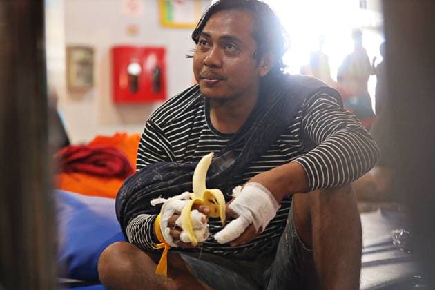August 4, 2026, Surabaya, Indonesia: SURABAYA, EAST JAVA, INDONESIA Ã¢â‚¬ AUGUST 4, 2026: Survivors of the KM Mutiara Sentosa II ferry fire arrive at Tanjung Perak Port aboard the KM Masalembo in Surabaya, East Java, Indonesia, on August 4, 2026. Survivors described a chaotic evacuation, saying passengers received little or no guidance from the crew, searched for life jackets on their own, and some jumped into the sea before drifting for hours until they were rescued. Their accounts contrast with information provided by the ferry operator to the Indonesian National Search and Rescue Agency (BASARNAS), which stated that all 238 passengers were wearing life jackets during the evacuation. According to BASARNAS, 233 people survived and five - ZUMAq101 20260804_zna_q101_074 Copyright: xAndrexYurisx