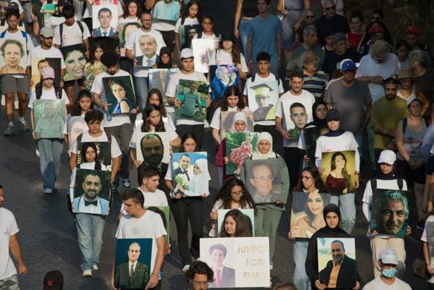 Beirut Port Explosion Commemoration BEIRUT, LEBANON - August 4: Marches carry photographs of the victims of the Aug. 4, 2020 Beirut Port explosion as they walk to the port during commemorations for the sixth anniversary of the blast. Beirut LB Copyright: x xNicholasxFrakesx xJNAxPressx