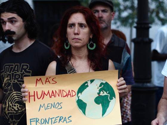 August 4, 2026, Madrid, Madrid, Spain: MADRID, SPAIN - AUGUST 04: Under the slogan Ã¢â‚¬oeBorders Kill,Ã¢â‚¬Â around a hundred people gathered in Plaza de Lavapio s in Madrid to demonstrate over the nearly 100 people who died attempting to cross from Morocco to Spain by sea. Madrid Spain - ZUMAh199 20260804_zip_h199_001 Copyright: xAaronxHerediax