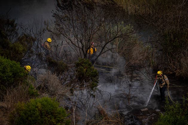 August 4, 2026, Oceanside, California, USA: Oceanside Fire Department and CalFire knock down the Capistrano Fire which erupted along the San Luis Rey river on August 8, 2026. Oceanside USA - ZUMAg219 20260804_znp_g219_001 Copyright: xJakexLeexGreenx