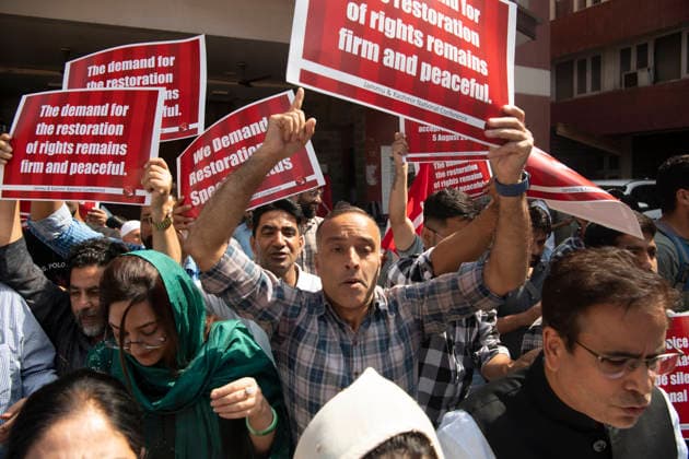 August 5, 2026, Srinagar, Jammu And Kashmir, India: National Conference leaders and workers hold placards during a protest marking the seventh anniversary of the abrogation of Article 370 and the revocation of Jammu and Kashmir s special status, in Srinagar. Today marks the seventh anniversary of the abrogation of Article 370. On August 5, 2019, the Government of India revokes Article 370 of the Constitution, which grants special status to Jammu and Kashmir, and bifurcates the state into two union territories--Jammu and Kashmir, and Ladakh. Srinagar India - ZUMAz120 20260805_zip_z120_019 Copyright: xBasitxZargarx
