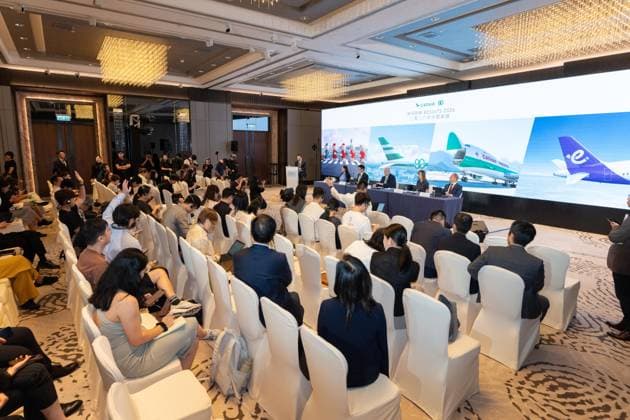 HONG KONG-BUSINESS CATHAY-RESULTS Journalists raise their hands to ask questions during the Cathay Group 2026 interim results announcement press briefing on August 5, 2026 in Hong Kong. The airline group announced an attributable profit of HK$6.2 billion in the first half of 2026, and declared a first interim dividend of HK26 cents per ordinary share. (Photo by Kevin Li TMHK via Nexpher Images) Hong Kong