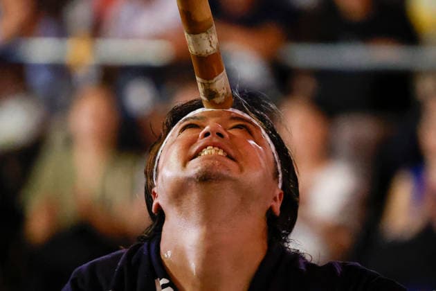 August 5, 2026, Akita, Japan: A participant balances a bamboo pole adorned with paper lanterns (kanto) on his forehead during the Akita Kanto Festival in Akita City. The annual event is one of the Tohoku region s three great festivals, where street performers skillfully balance over 270 towering bamboo poles (with the largest measuring 12 meters and weighing 50 kilograms) adorned with up to 46 candle-lit paper lanterns on their hands, shoulders, and foreheads to the rhythmic chant of dokkoisho. The festival runs from August 3 to 6. Akita Japan  - ZUMAm191 20260805_aap_m191_016 Copyright: xRodrigoxReyesxMarinx